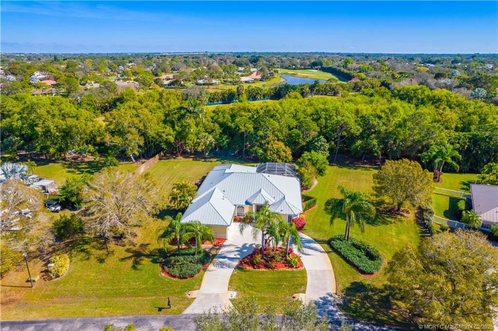 Photo of 4989 SW Lake Grove Circle, Palm City, FL 34990 (MLS # M20048914)