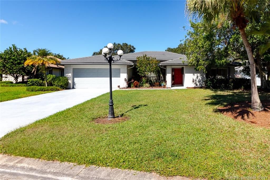 Photo of 2343 SW Spoonbill Drive, Palm City, FL 34990 (MLS # M20046868)