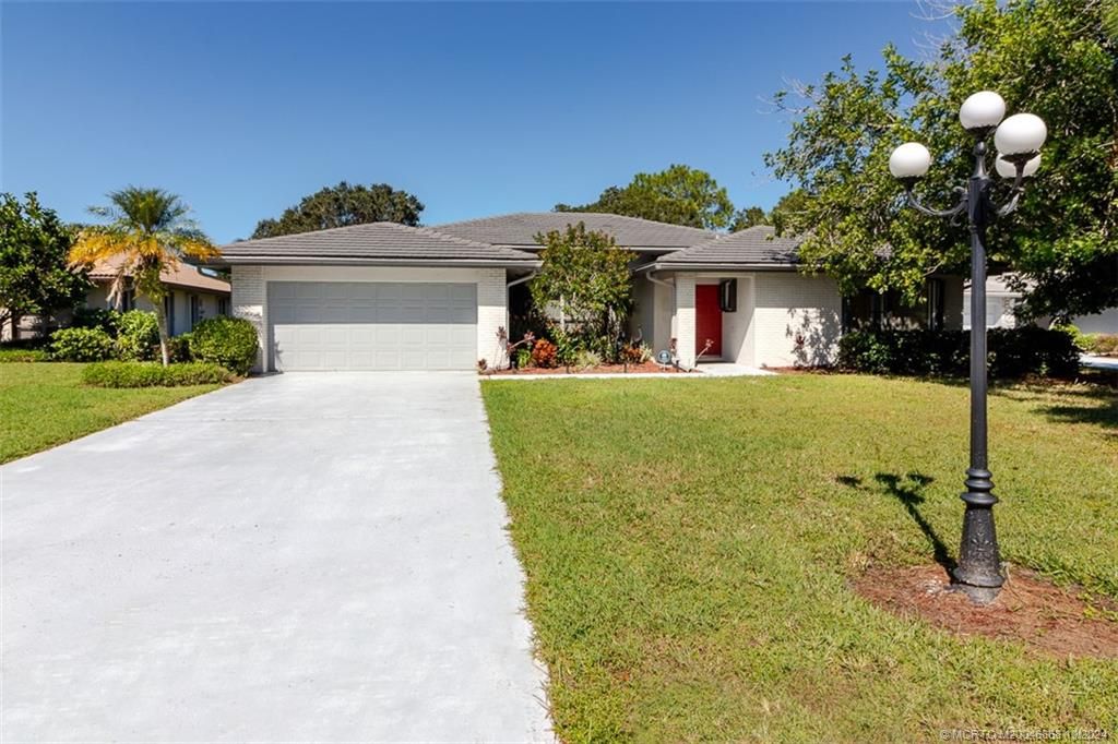Photo of 2343 SW Spoonbill Drive, Palm City, FL 34990 (MLS # M20046868)