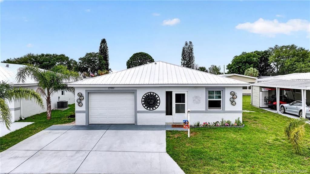 Photo of 13981 Adelfa Avenue, Fort Pierce, FL 34951 (MLS # M20055204)