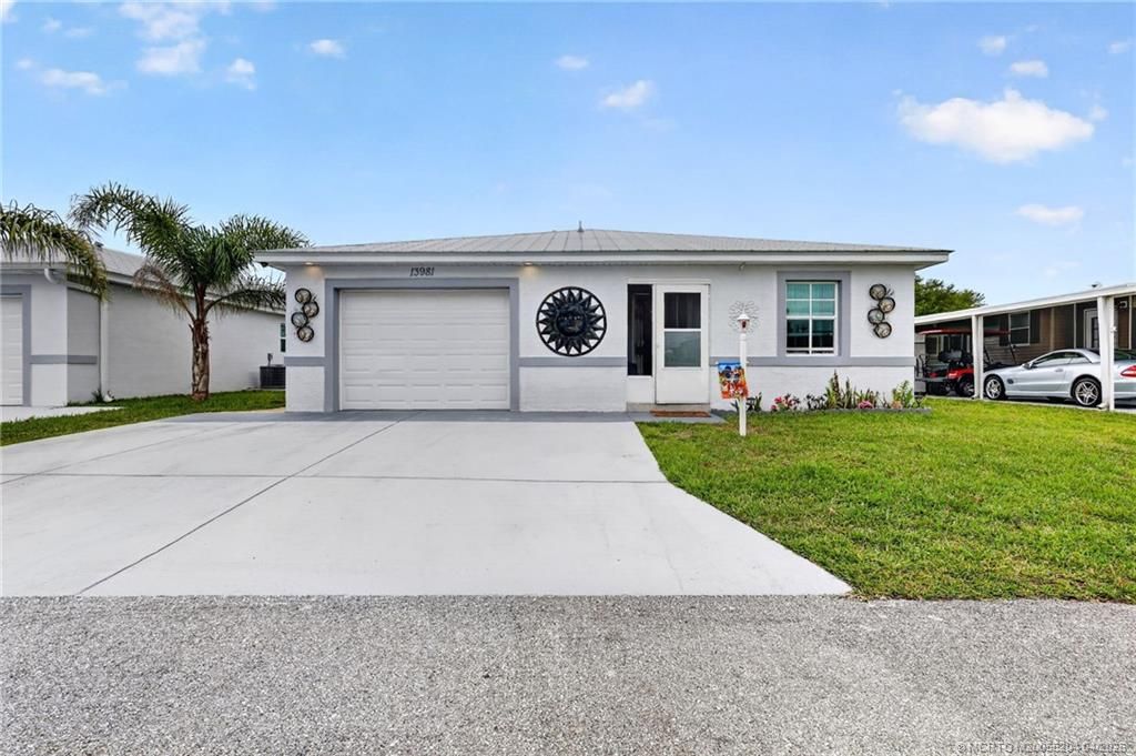 Photo of 13981 Adelfa Avenue, Fort Pierce, FL 34951 (MLS # M20055204)