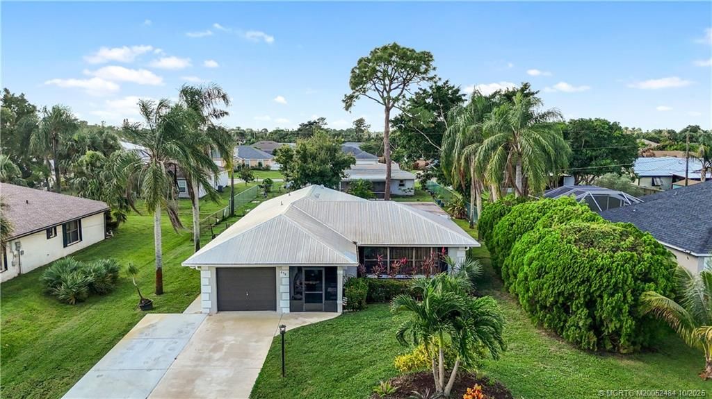 Photo of 838 SE Cavern Avenue, Port Saint Lucie, FL 34983 (MLS # M20052484)