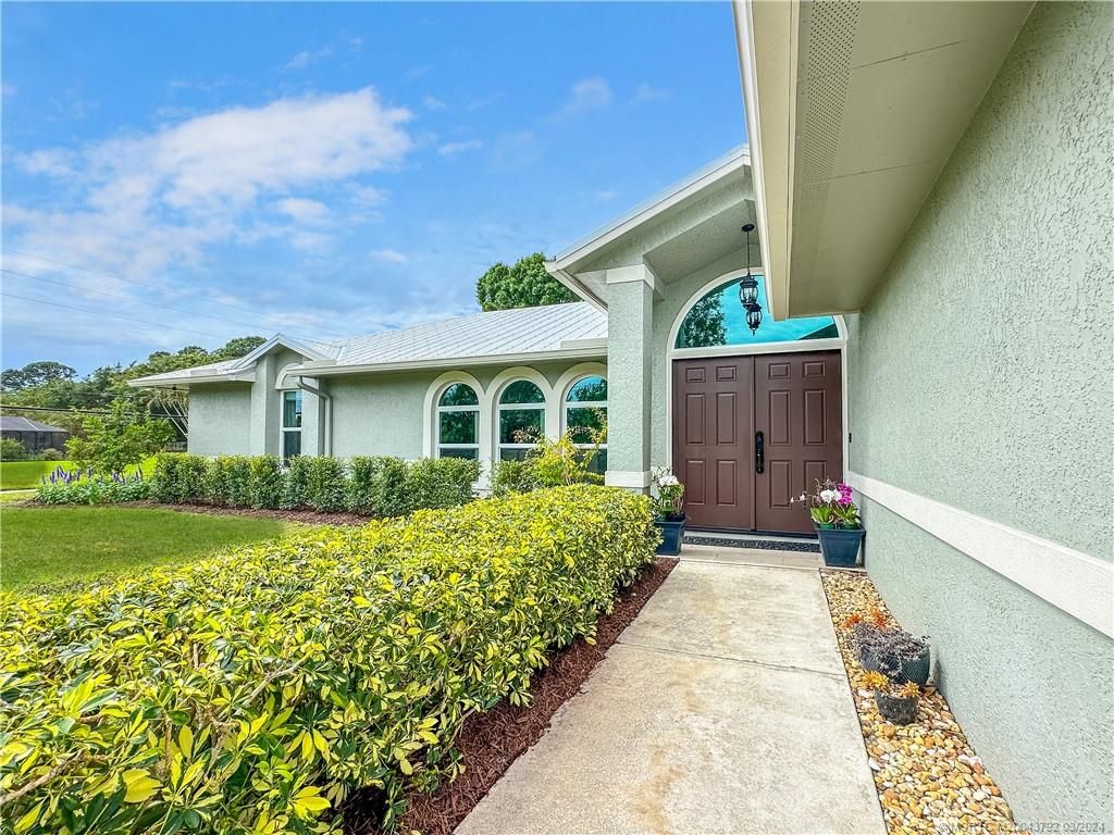 Photo of 3380 SW Hill Street, Port Saint Lucie, FL 34953 (MLS # M20043792)