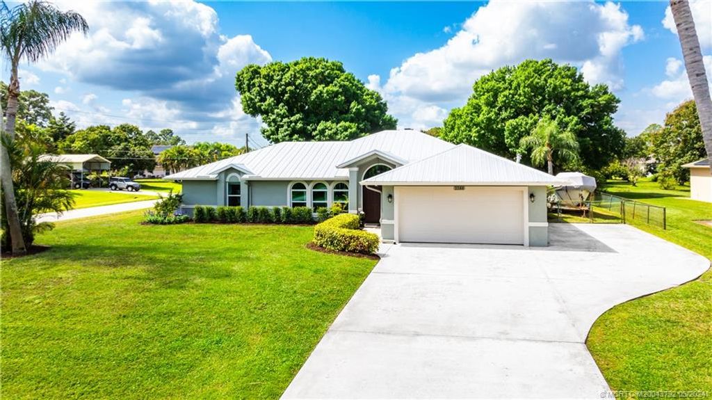 Photo of 3380 SW Hill Street, Port Saint Lucie, FL 34953 (MLS # M20043792)
