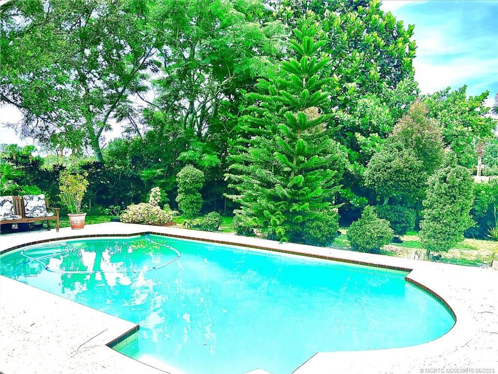 Photo of 379 SW Fairway Avenue, Port Saint Lucie, FL 34983 (MLS # M20039610)