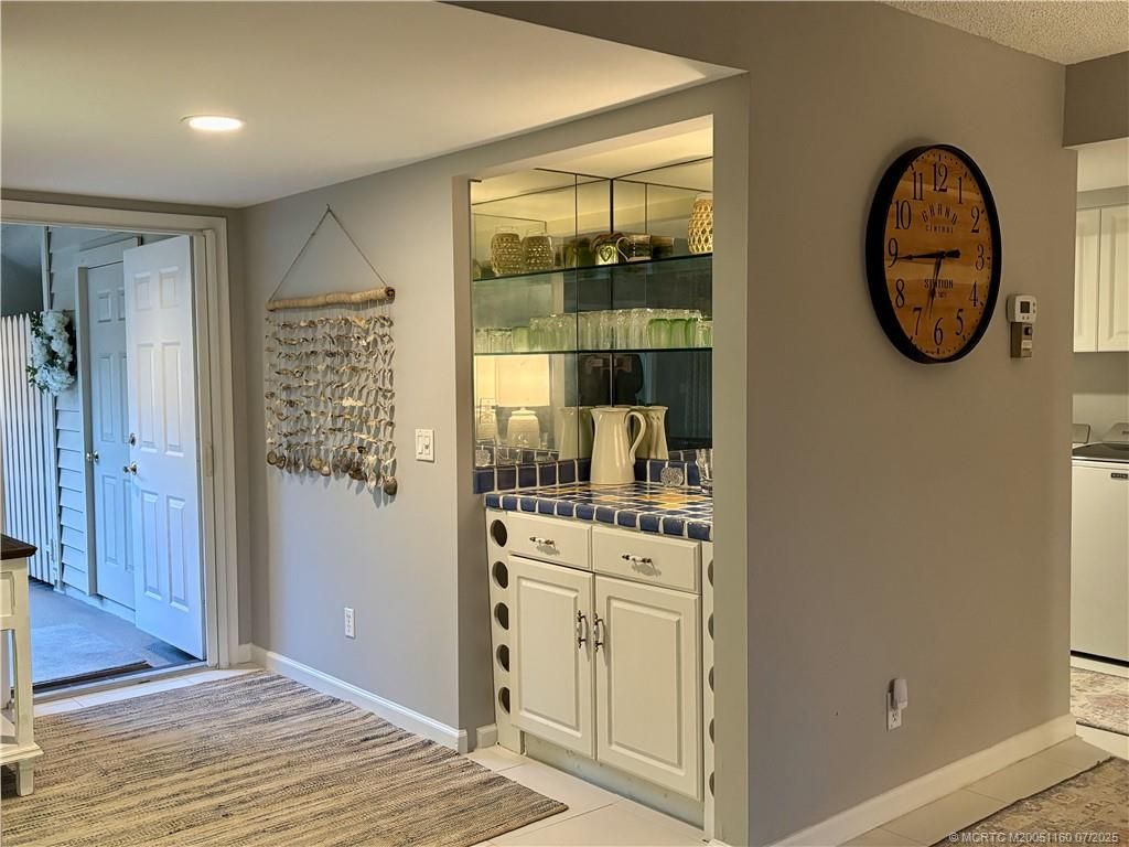 Photo of 5152 SE Club Way #104, Stuart, FL 34997 (MLS # M20051160)