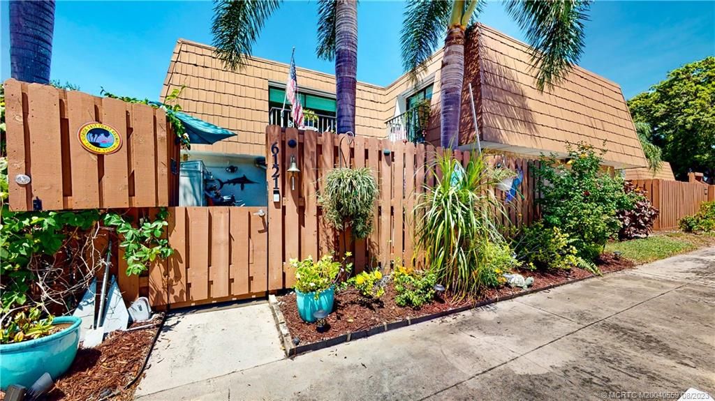 Photo of 6121 SE Riverboat Drive SE #1033, Stuart, FL 34997 (MLS # M20040559)