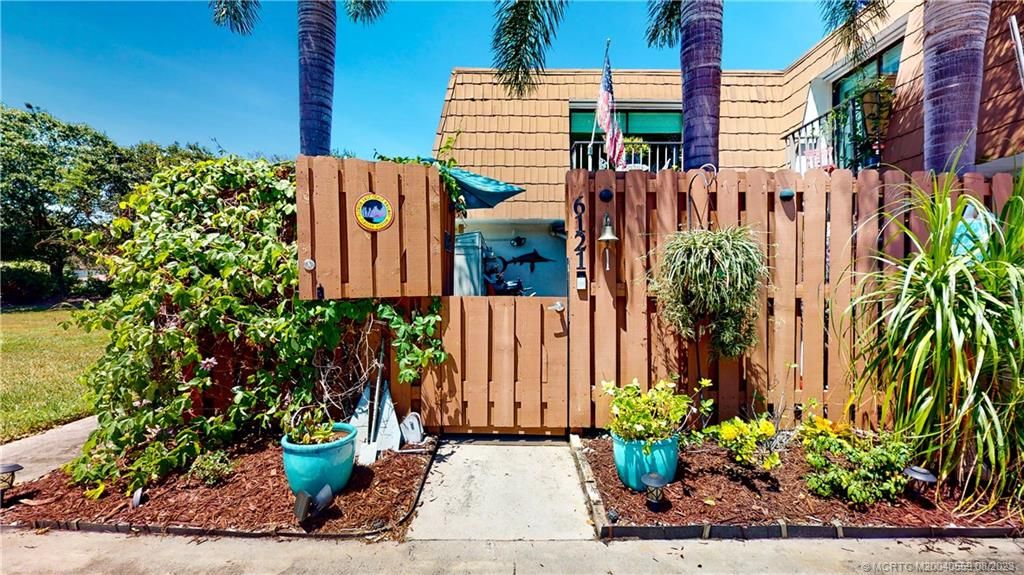 Photo of 6121 SE Riverboat Drive SE #1033, Stuart, FL 34997 (MLS # M20040559)