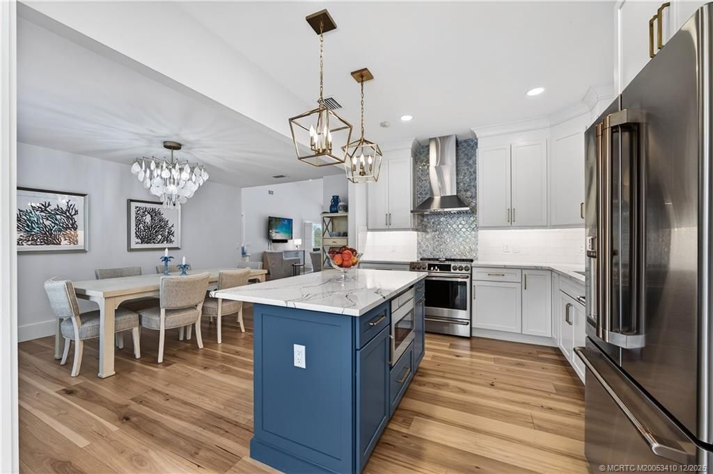 Photo of 12445 Harbour Ridge Boulevard #3-8, Palm City, FL 34990 (MLS # M20053410)