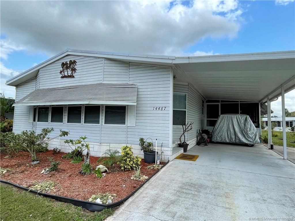 Photo of 14467 SW Golf Club Drive, Indiantown, FL 34956 (MLS # M20048917)