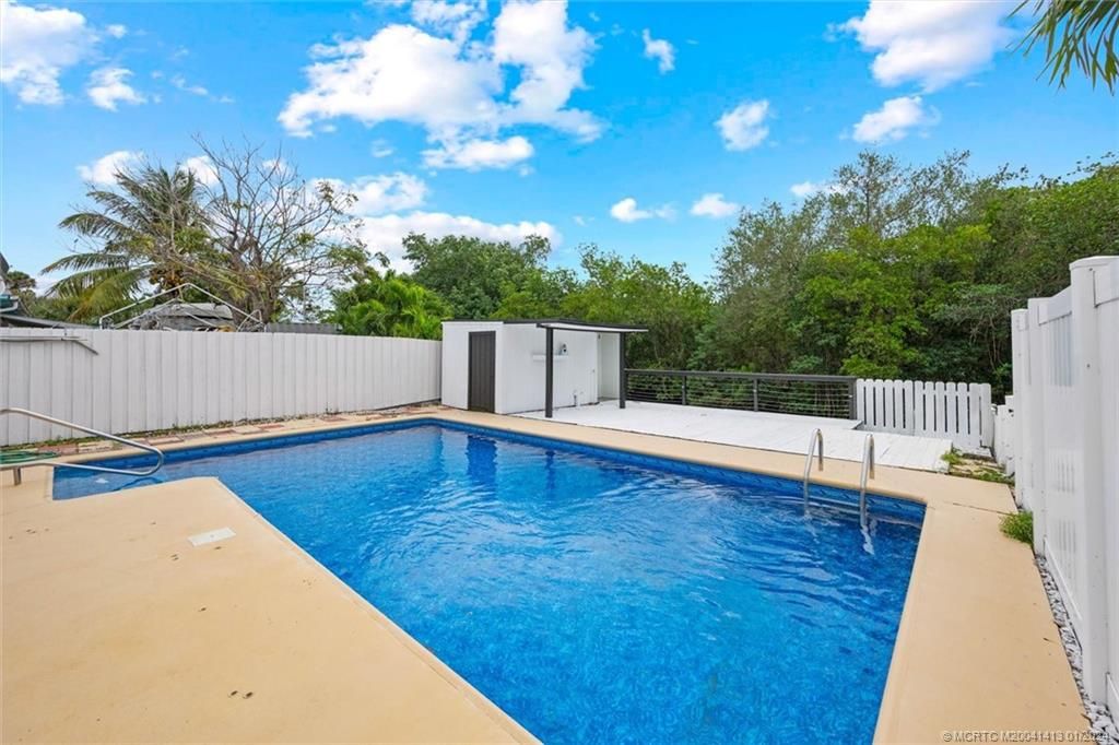 Photo of 40 SW Hideaway Place, Stuart, FL 34994 (MLS # M20041413)