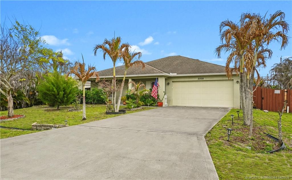 Photo of 2009 SW Monterrey Lane, Port Saint Lucie, FL 34953 (MLS # M20055384)