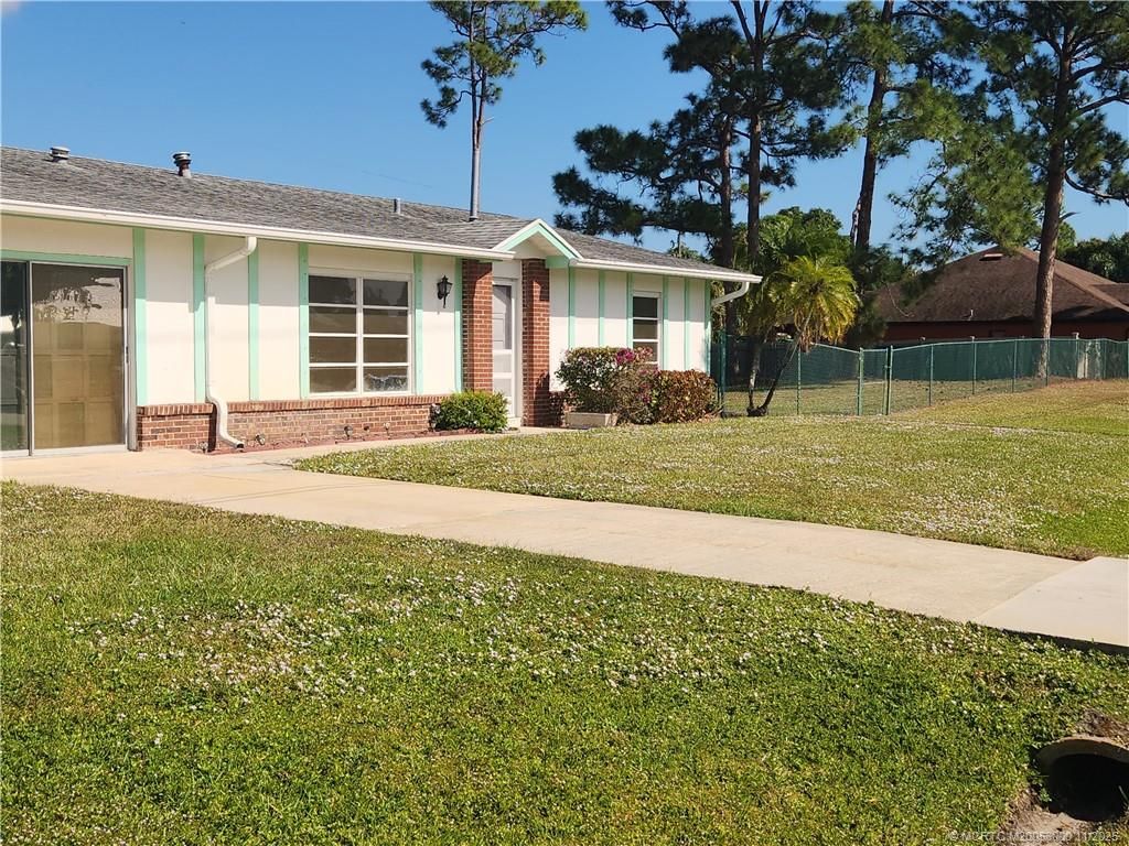 Photo of 561 NW Floresta Drive, Port Saint Lucie, FL 34983 (MLS # M20053000)