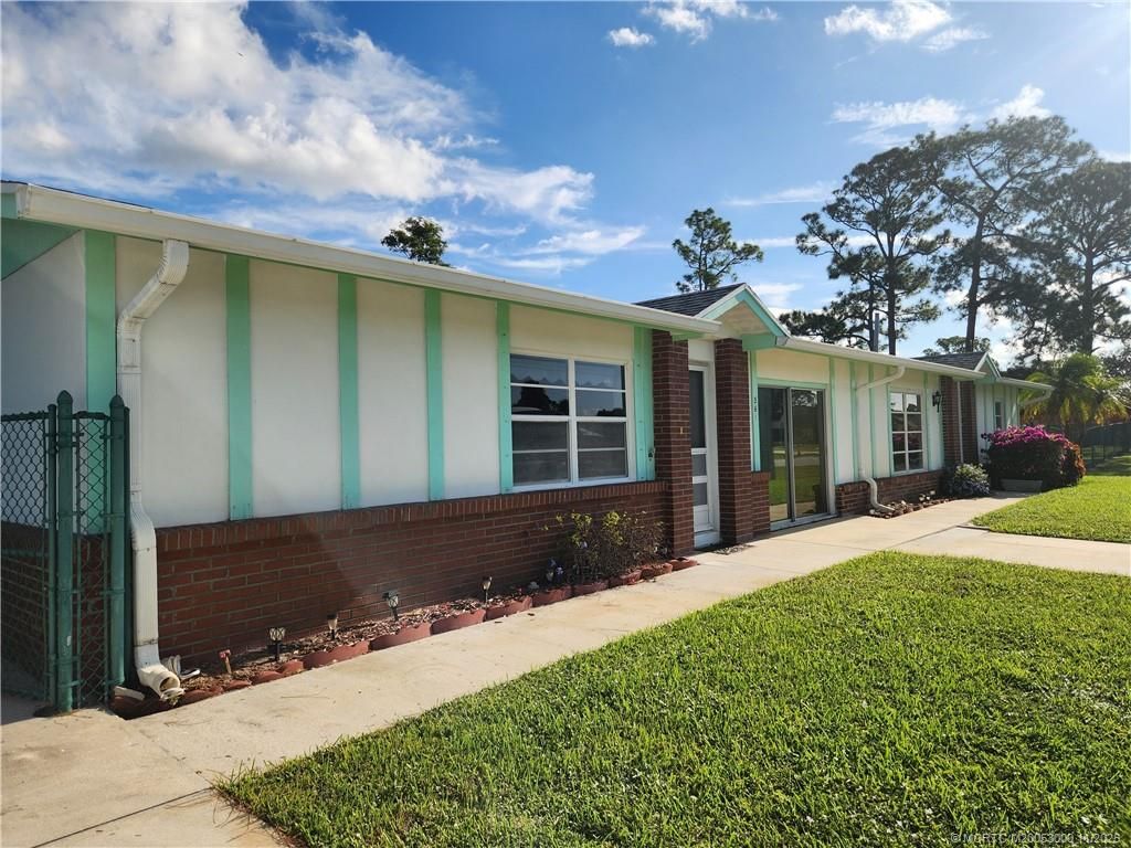 Photo of 561 NW Floresta Drive, Port Saint Lucie, FL 34983 (MLS # M20053000)