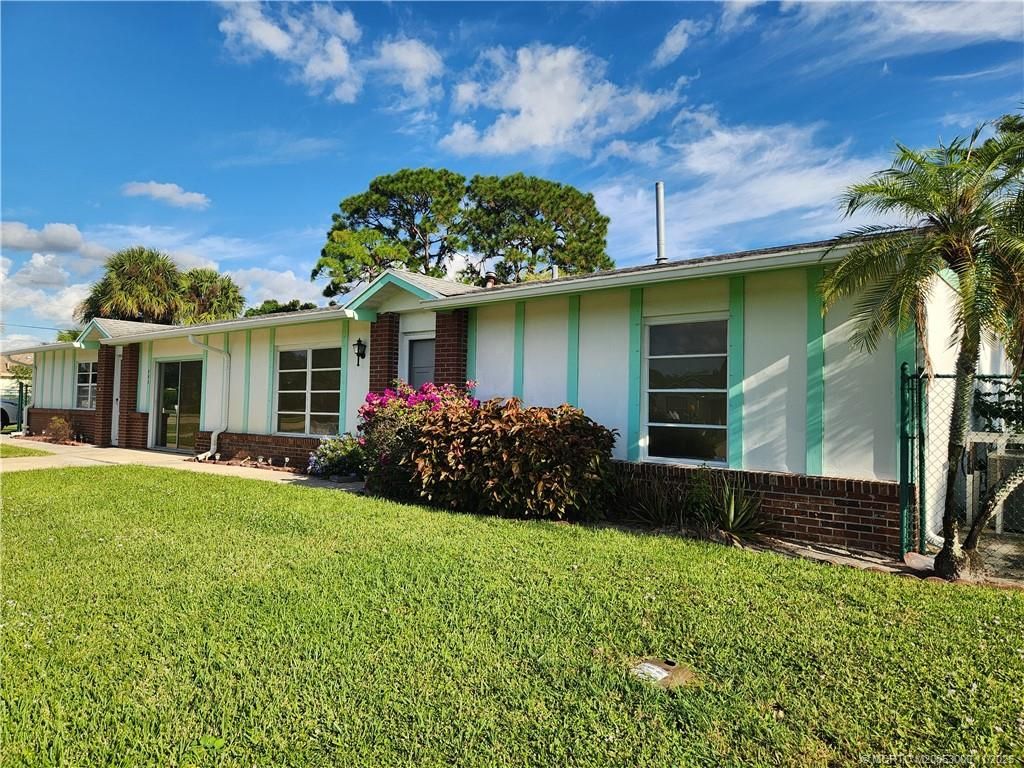 Photo of 561 NW Floresta Drive, Port Saint Lucie, FL 34983 (MLS # M20053000)