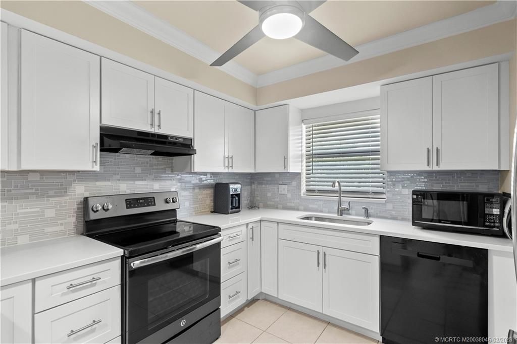 Photo of 4885 SE Capstan Avenue #E-27, Stuart, FL 34997 (MLS # M20038046)