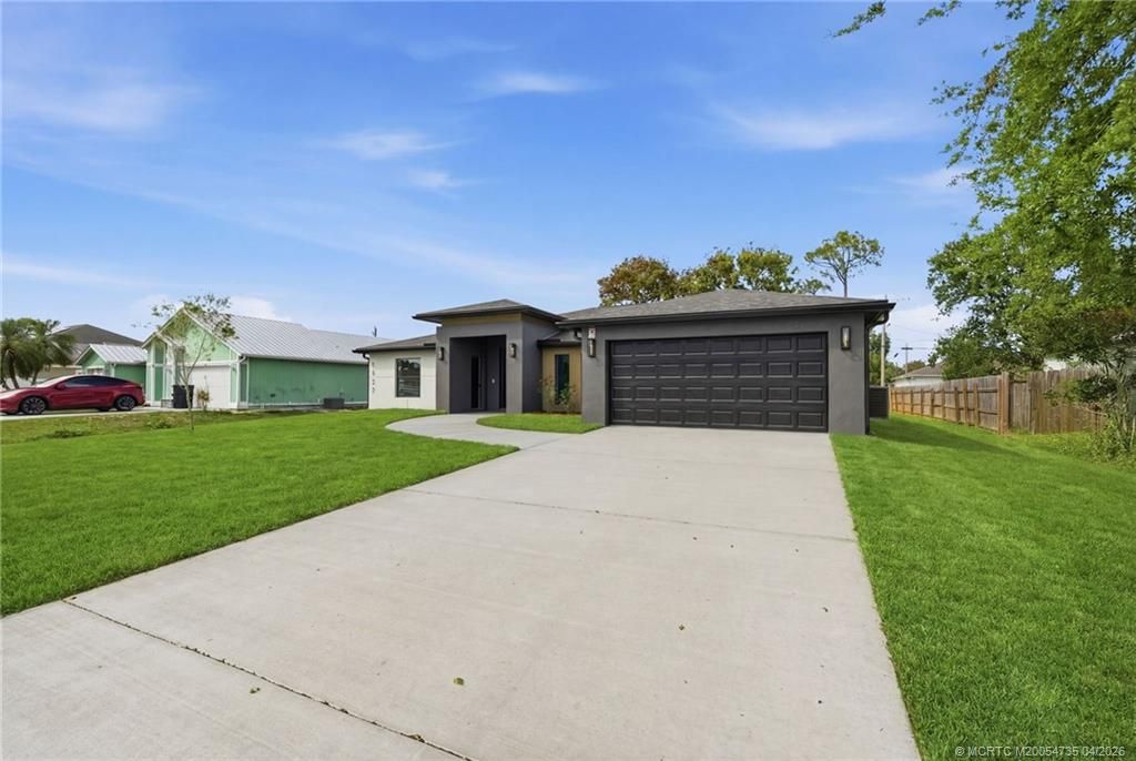 Photo of 1457 SW Dow Lane, Port Saint Lucie, FL 34953 (MLS # M20054735)