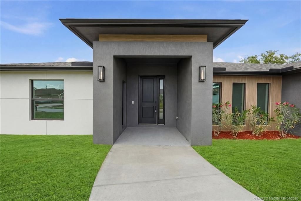 Photo of 1457 SW Dow Lane, Port Saint Lucie, FL 34953 (MLS # M20054735)