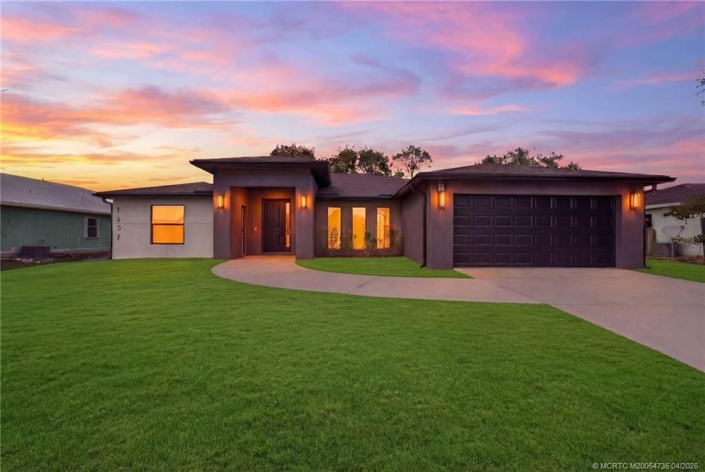 Photo of 1457 SW Dow Lane, Port Saint Lucie, FL 34953 (MLS # M20054735)