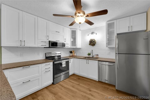 Photo of 6508 SE Windsong Lane, Stuart, FL 34997 (MLS # M20057019)