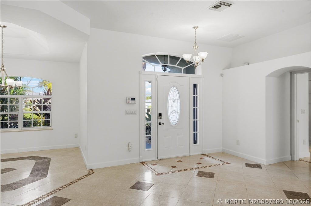 Photo of 1498 SW Bartell Avenue, Port Saint Lucie, FL 34953 (MLS # M20057360)