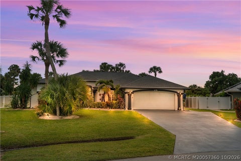 Photo of 1498 SW Bartell Avenue, Port Saint Lucie, FL 34953 (MLS # M20057360)