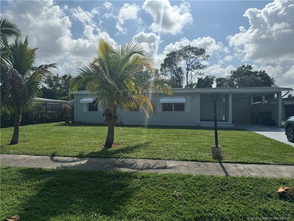Photo of 140 Banyan Drive, Port Saint Lucie, FL 34952 (MLS # M20047560)