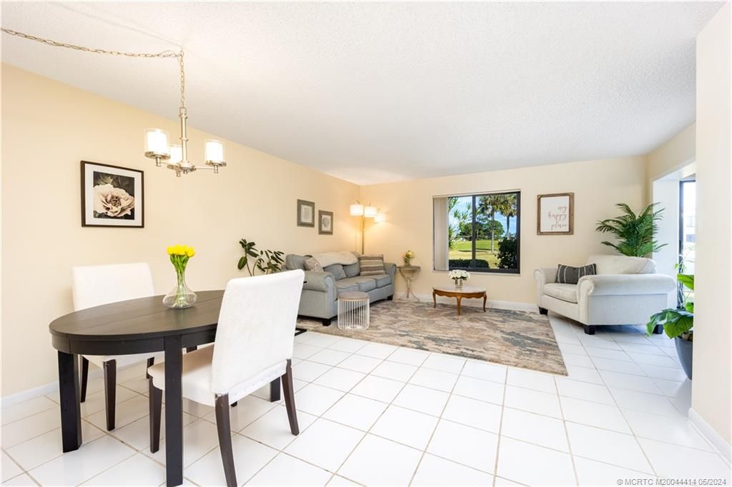 Photo of 5473 SE Miles Grant Road #A104, Stuart, FL 34997 (MLS # M20044414)