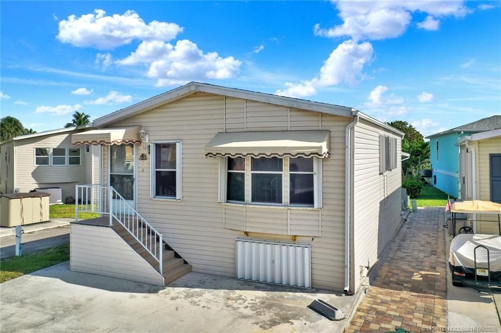 Photo of 1357 Nettles Boulevard, Jensen Beach, FL 34957 (MLS # M20050816)