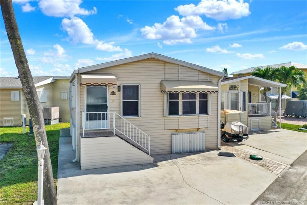 Photo of 1357 Nettles Boulevard, Jensen Beach, FL 34957 (MLS # M20050816)