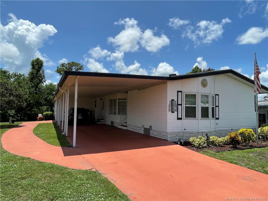 Photo of 14711 SW Divot Drive, Indiantown, FL 34956 (MLS # M20056364)