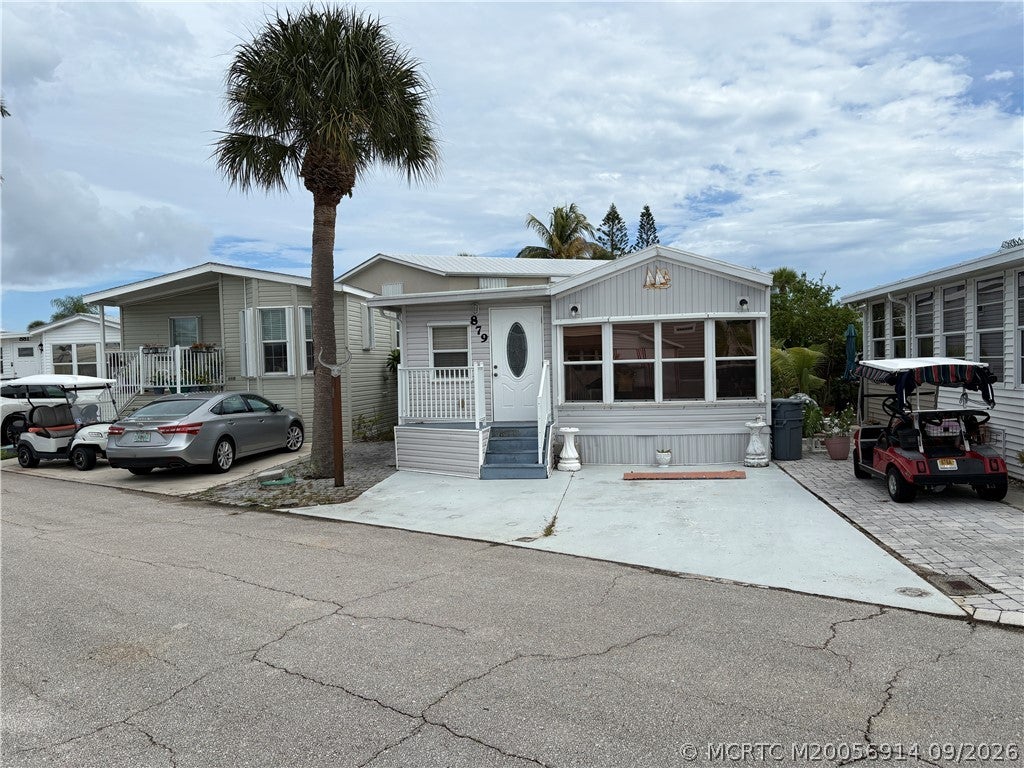 Photo of 879 Nettles Boulevard, Jensen Beach, FL 34957 (MLS # M20056914)