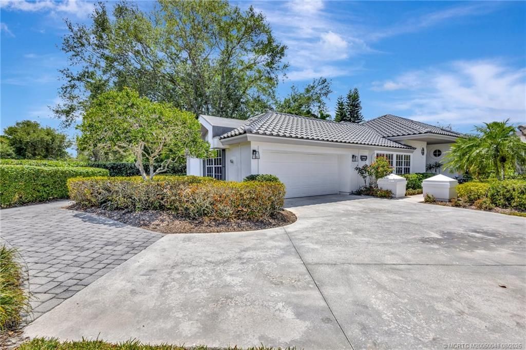 Photo of 12306 Harbour Ridge Boulevard, Palm City, FL 34990 (MLS # M20050048)