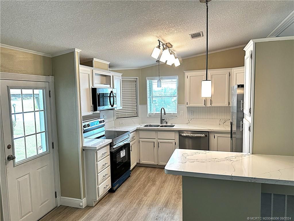 Photo of 8921 SW Chevy Circle, Stuart, FL 34997 (MLS # M20046006)