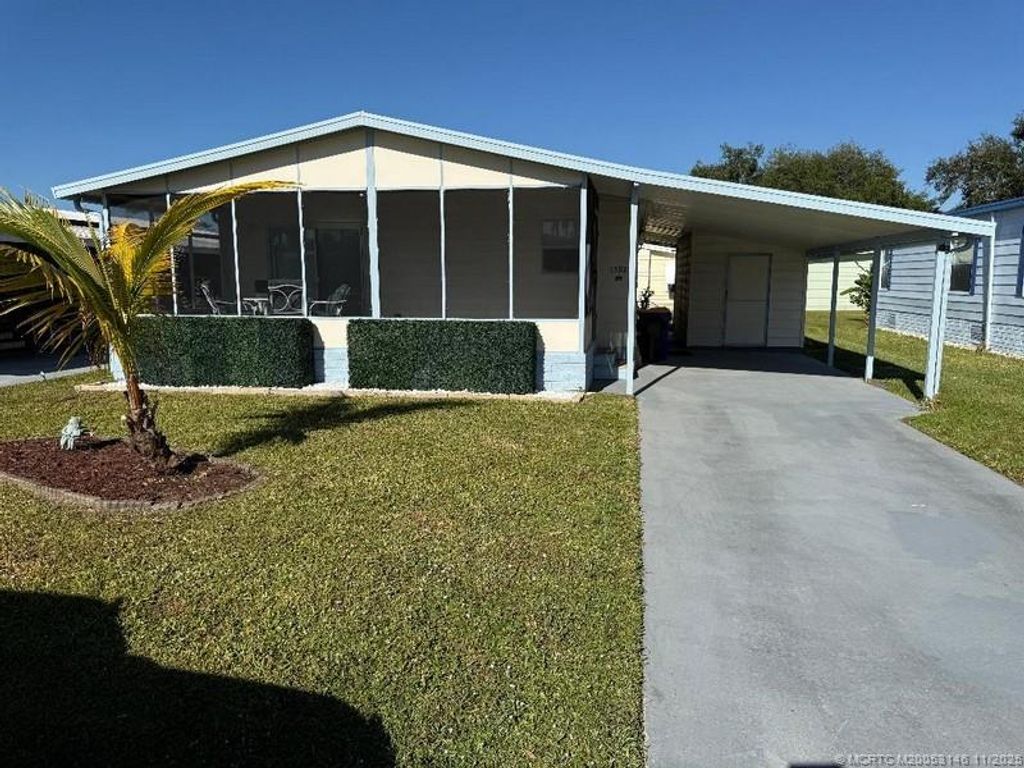 Photo of 15925 Indianwood Circle SW, Indiantown, FL 34956 (MLS # M20053146)