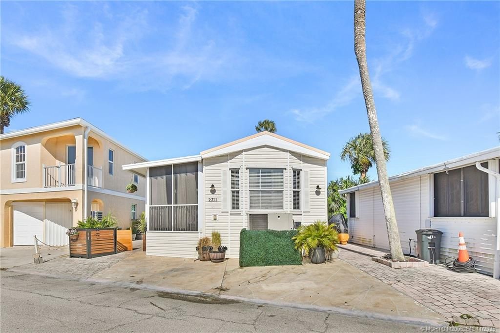 Photo of 10725 S Ocean Drive #311, Jensen Beach, FL 34957 (MLS # M20052842)