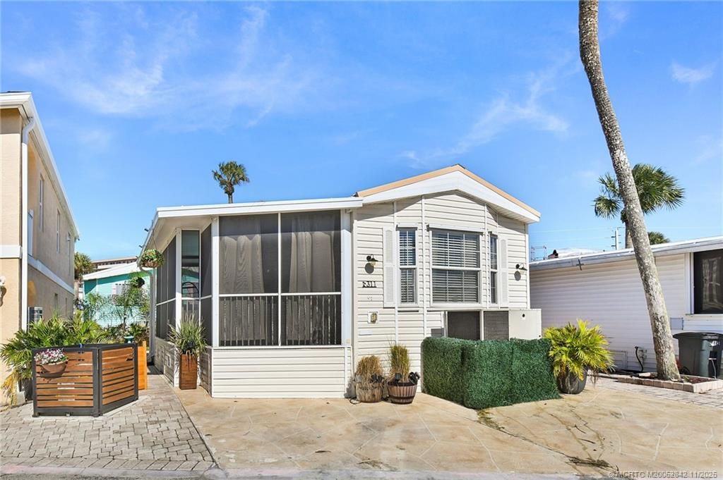 Photo of 10725 S Ocean Drive #311, Jensen Beach, FL 34957 (MLS # M20052842)