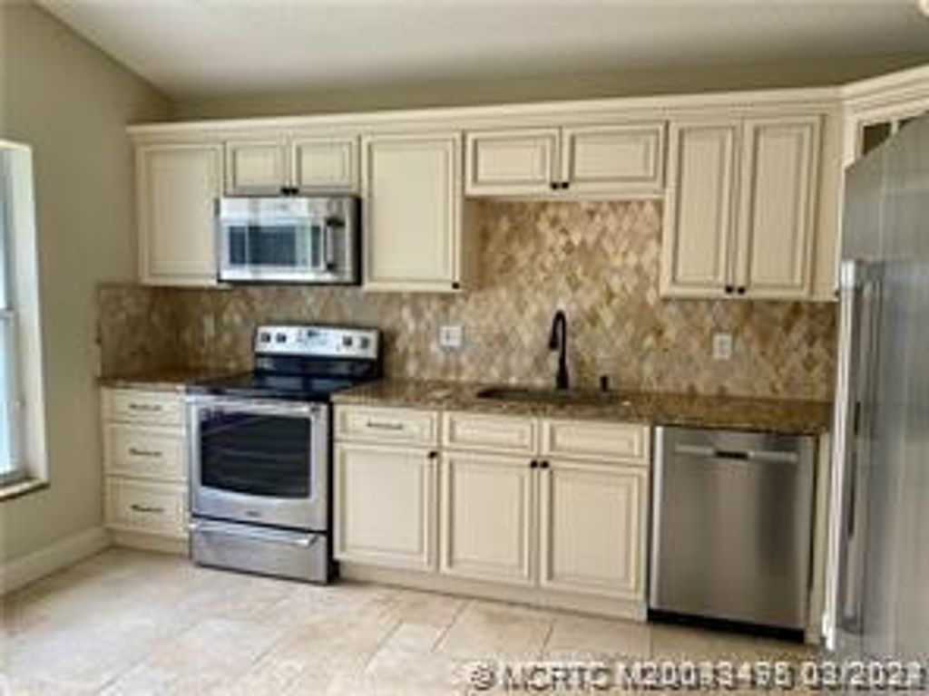 Photo of 2181 SW Olympic Club Terrace, Palm City, FL 34990 (MLS # M20043495)