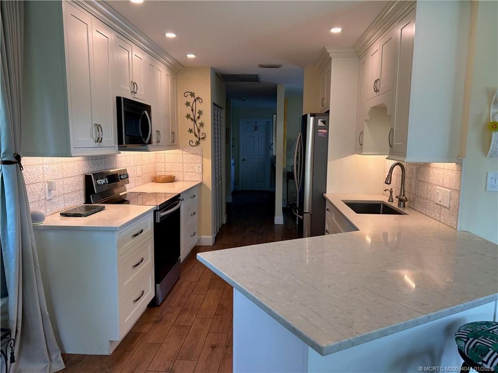 Photo of 1898 SE Coronado Lane, Stuart, FL 34996 (MLS # M20054041)