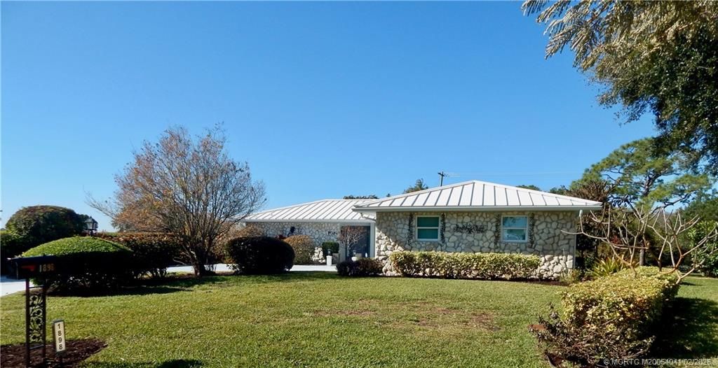 Photo of 1898 SE Coronado Lane, Stuart, FL 34996 (MLS # M20054041)