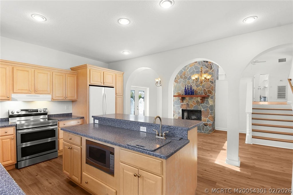 Photo of 2228 NE Center Circle, Jensen Beach, FL 34957 (MLS # M20054301)