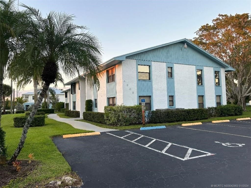 Photo of 4885 SE Capstan Avenue #E-26, Stuart, FL 34997 (MLS # M20042863)