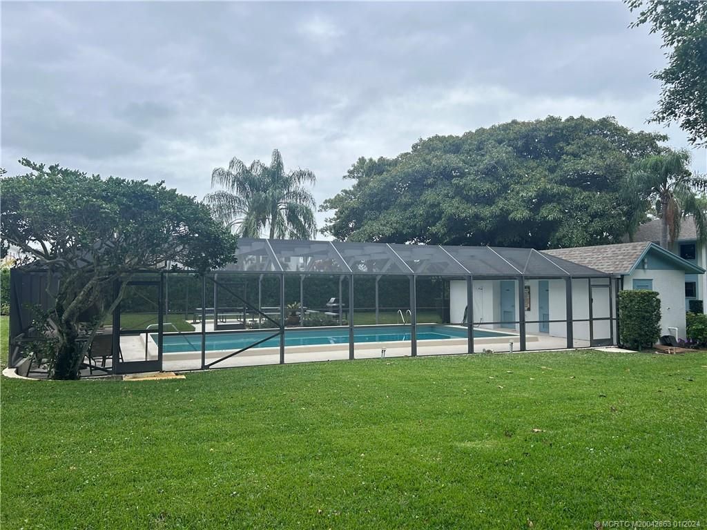 Photo of 4885 SE Capstan Avenue #E-26, Stuart, FL 34997 (MLS # M20042863)