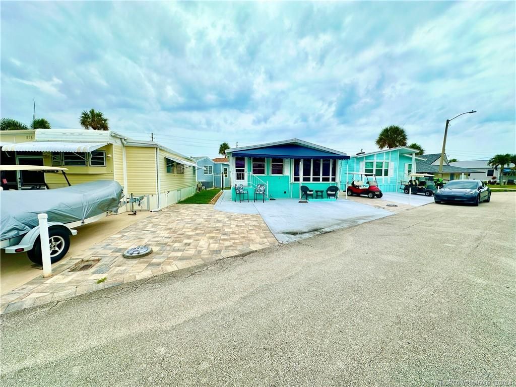 Photo of 855 Nettles Boulevard, Jensen Beach, FL 34957 (MLS # M20045009)