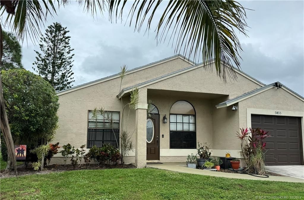 Photo of 5855 SE Mitzi Lane, Stuart, FL 34997 (MLS # M20042380)