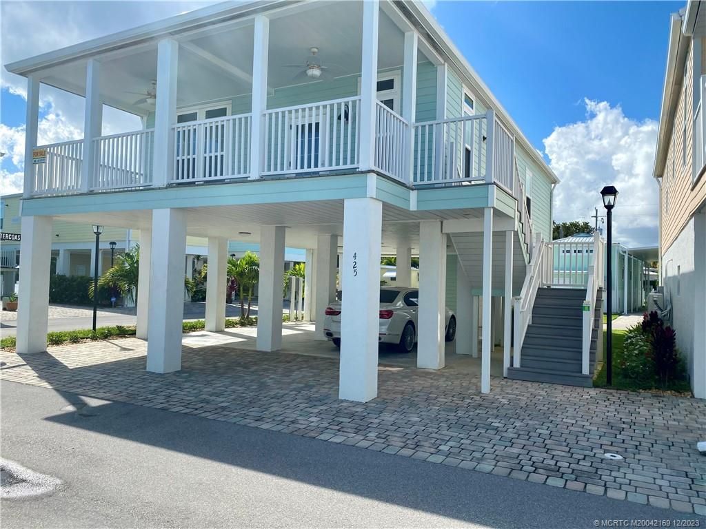 Photo of 425 NE Intracoastal Drive, Jensen Beach, FL 34957 (MLS # M20042169)