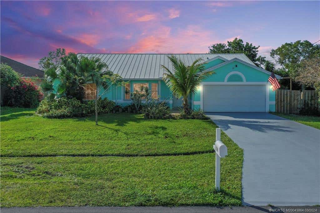 Photo of 2367 SE Heathwood Circle, Port Saint Lucie, FL 34952 (MLS # M20043864)
