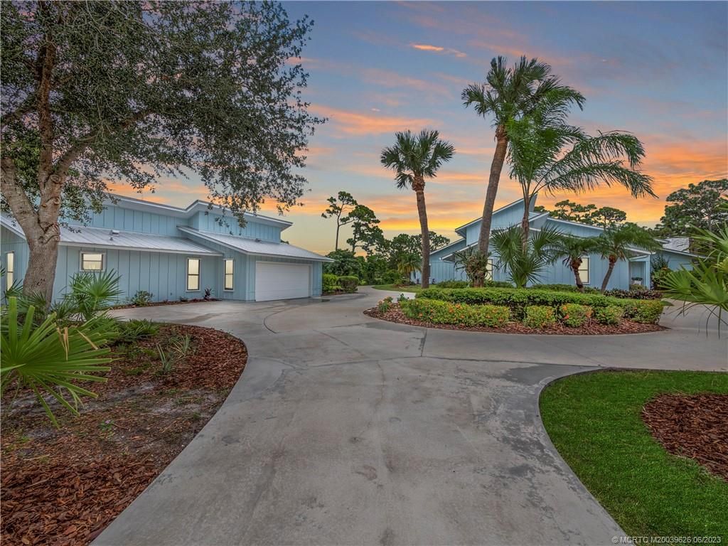 Photo of 411 NE Town Terrace, Jensen Beach, FL 34957 (MLS # M20039626)