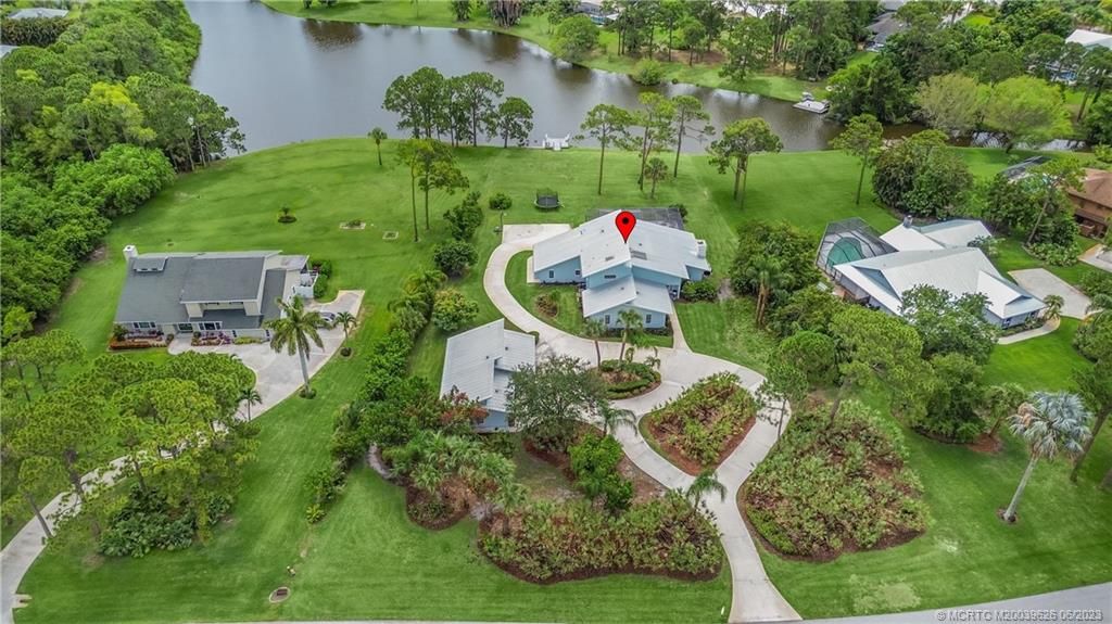 Photo of 411 NE Town Terrace, Jensen Beach, FL 34957 (MLS # M20039626)