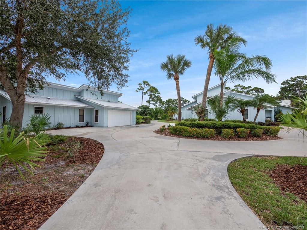 Photo of 411 NE Town Terrace, Jensen Beach, FL 34957 (MLS # M20039626)
